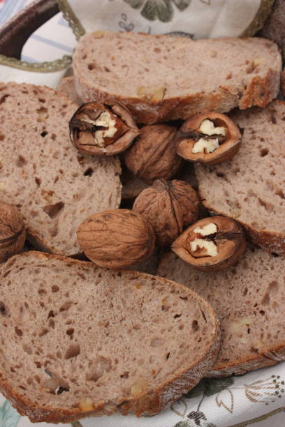 istock Loaf of bread with nuts  Sliced bread  Sliced bread in a basket 1059034738