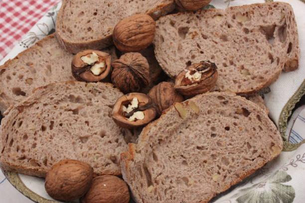 istock Loaf of bread with nuts  Sliced bread  Sliced bread in a basket 1059034740