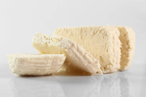 istock Capreggio Goat Cheese. Isolated on gray background. 1059041318