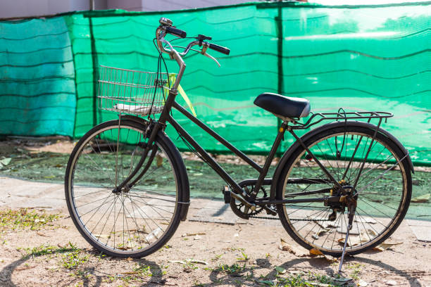 istock Black vintage bicycle on the sand 1059055166