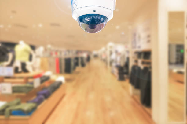 istock CCTV around safety security on blur shop store background. 1059068948