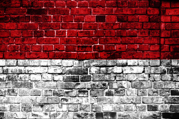 istock National flag of Indonesia on a brick background. 1059069220