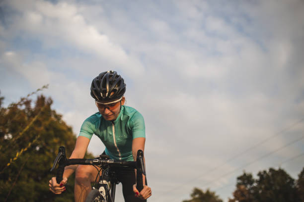 istock Professional female cyclist on racing bike 1059070830
