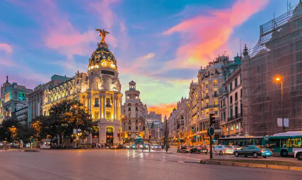 Madrid city skyline gran via street twilight , Spain