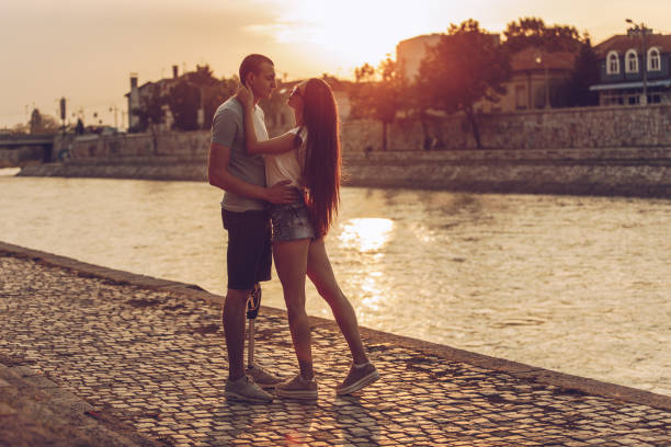 istock Young couple in sunset 1059077680