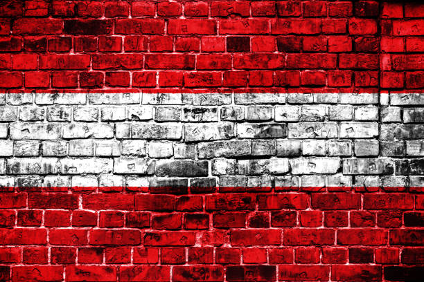 istock National flag of Austria on a brick background. 1059079548