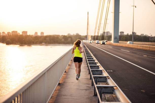 istock Sunset fitness on the bridge 1059086418