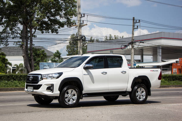 Private Pickup Truck Car New Toyota Hilux Revo  Rocco Chiangmai, Thailand - September 25 2018: Private Pickup Truck Car New Toyota Hilux Revo  Rocco. On road no.1001, 8 km from Chiangmai city. toyota hilux stock pictures, royalty-free photos & images