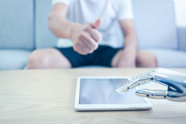 Senior man praising robot with thumb up indoors
