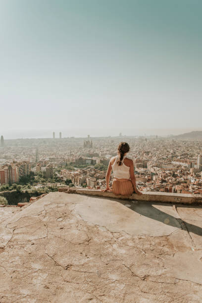 istock Woman looking at Barcelona 1059095380