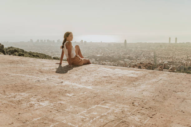 istock Woman looking at Barcelona 1059095440