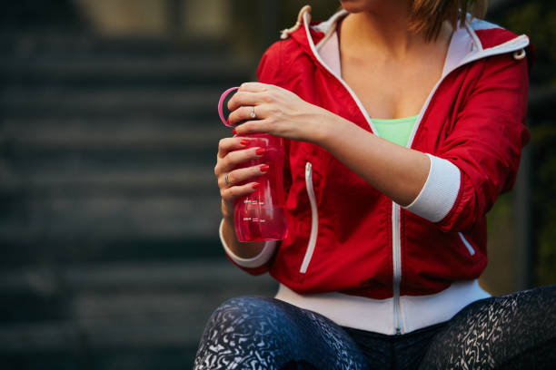 istock Fitness woman taking a break after workout. 1059097518