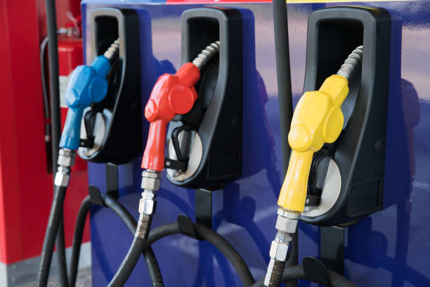 istock Pump nozzles at the gas station 1059099418
