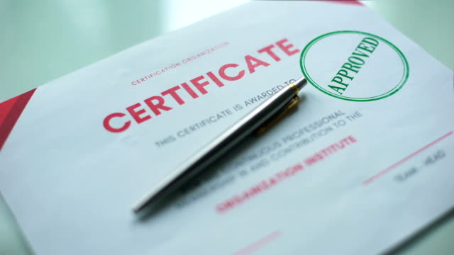 Certificate document approved, hand stamping seal on official paper, validation