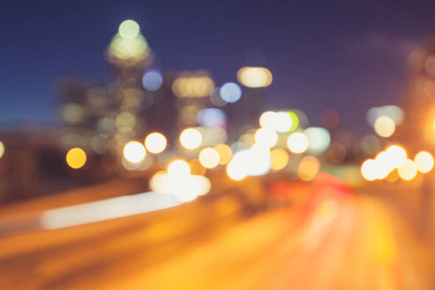 istock Abstract urban night light bokeh defocused background 1059103092