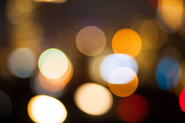 istock Abstract urban night light bokeh defocused background 1059104224