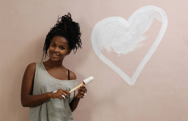 istock teenager painting 1059107914