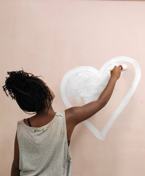 istock teenager painting 1059107920