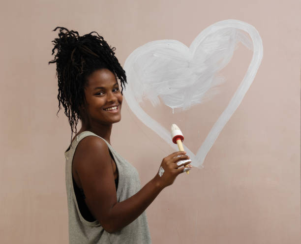 istock teenager painting 1059107924