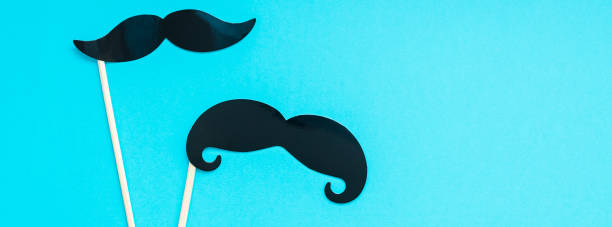 istock Paper moustaches for men fathers dad concept 1059108346