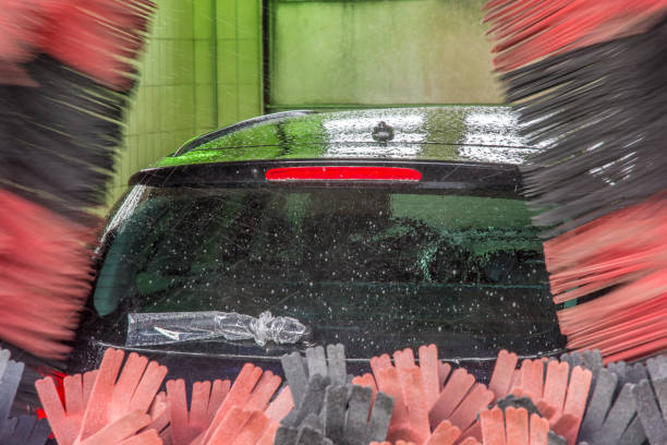 istock Car in a car wash with wrapped rear wiper 1059108380