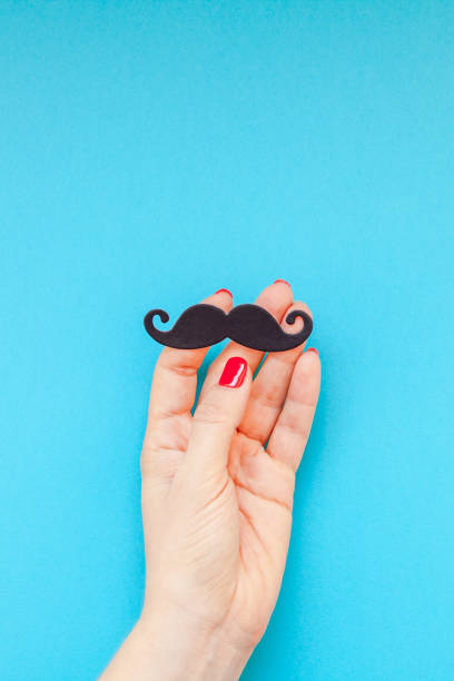 istock Paper moustaches for men fathers dad concept 1059108690