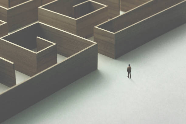 istock man entering wooden maze 1059110648