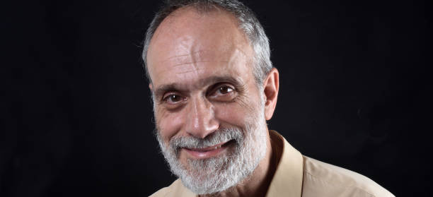 istock portrait of a middle aged man 1059111048
