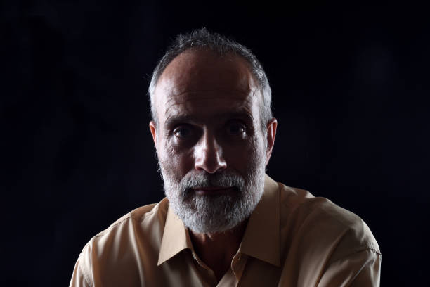 istock portrait of a middle aged man 1059111136