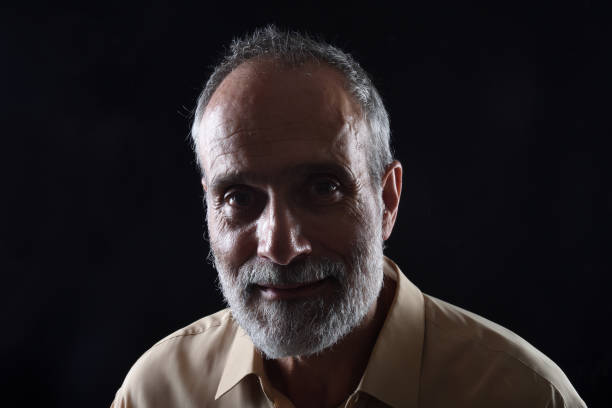 istock portrait of a middle aged man 1059111138