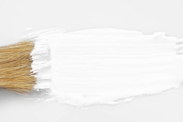 istock White paint stroke and brush 1059118274