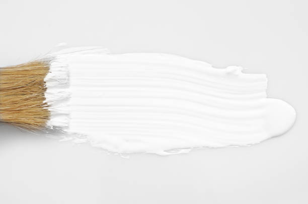 istock White paint stroke and brush 1059118276