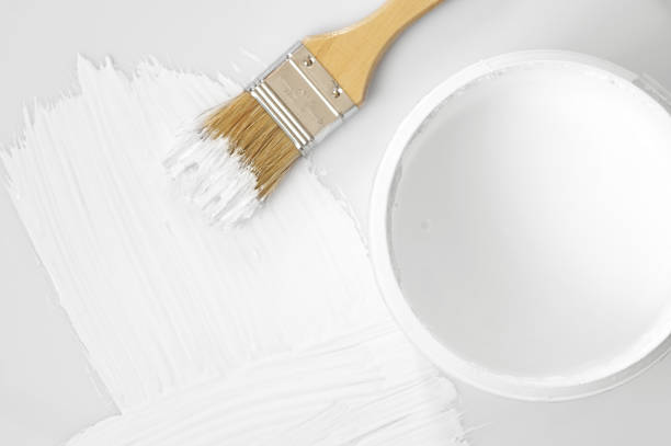 istock White paint stroke and brush 1059118382