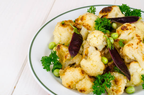 istock Vegetarian dish with cauliflower and peas 1059121936