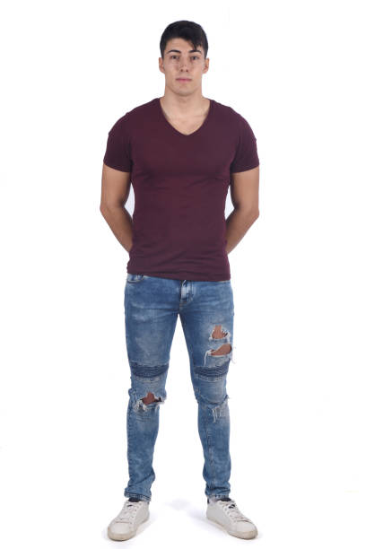 istock portrait of a young man on black background 1059125480