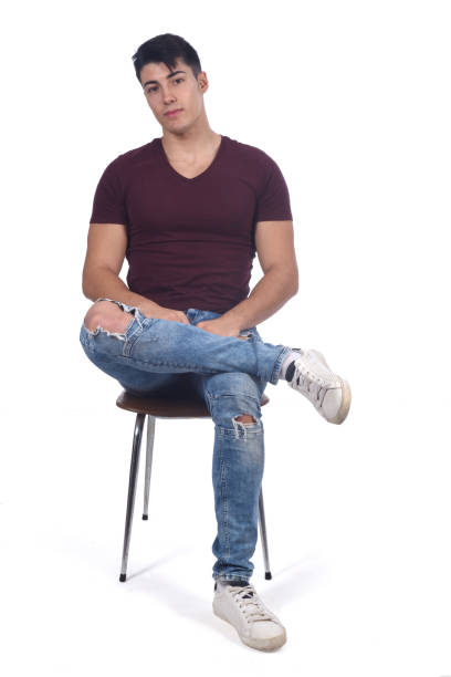 istock portrait of a young man on black background 1059125624