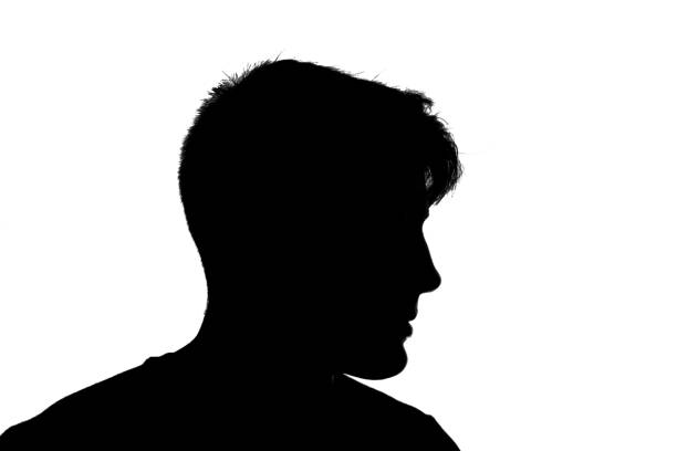 silhouette of a young man