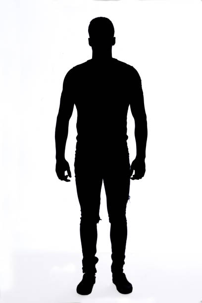 silhouette of a young man naked with jeans