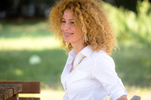 istock Woman with curly hair 1059130590