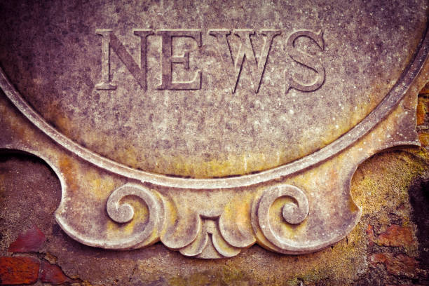 istock News written on stucco wall - concept image 1059130726