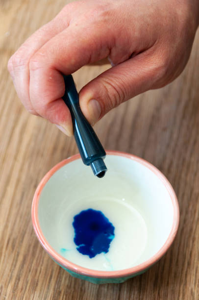 istock Women using food coloring 1059130992