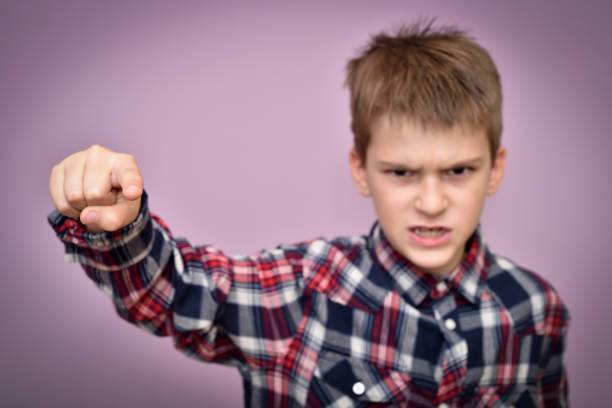 istock Angry and furious young boy 1059133686