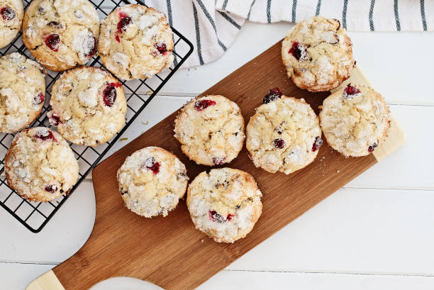 istock Fresh cranberry muffins cooling on a bakers rack 1059137002