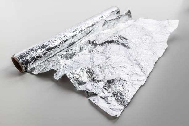 istock roll of aluminum foil isolated on white background 1059137086