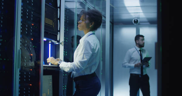 istock IT engineers with devices coworking in data center 1059137288