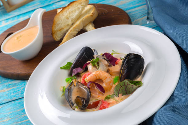 istock Tasty seafood on plate on table close-up 1059137904