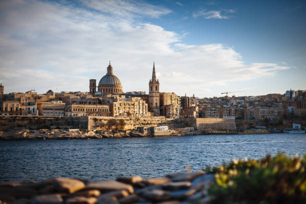 istock Valletta, Malta: skyline from Marsans Harbour at sunset 1059141454