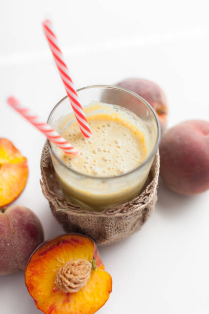 istock Glass of peach fresh 1059142024