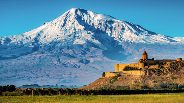 Khor Virap Monastery and Mt. Ararat Majestic snowcapped Mt. Ararat and monastery Khor Virap, Armenia dormant volcano stock pictures, royalty-free photos & images