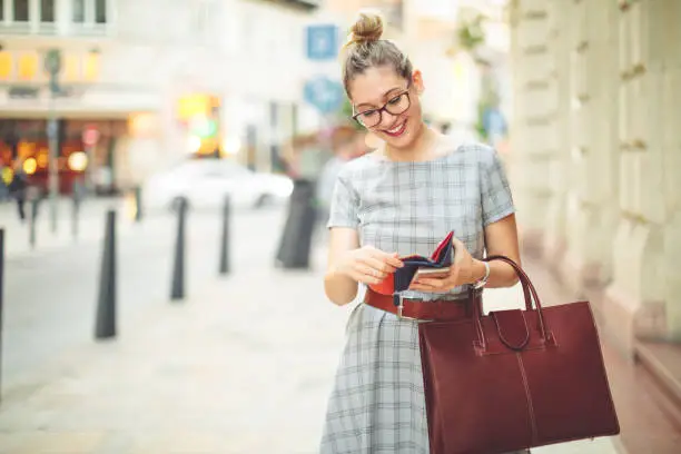 Young woman is having fun in the city - autumn mood